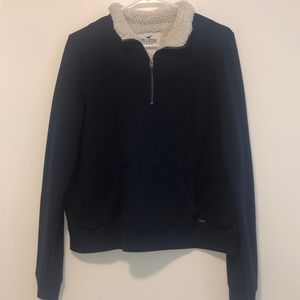 navy blue zip up with fur on the inside